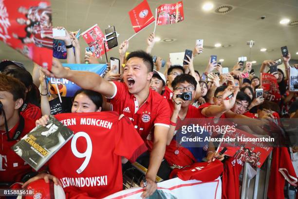 Supporters of FC Bayern Muenchen welcomes the team at Shanghai Pudong International Airport for the Audi Summer Tour 2017 on July 17, 2017 in...