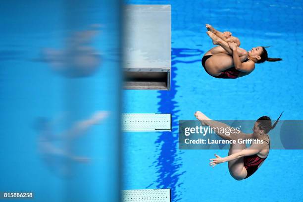 Vivian Barth of Switzerland and Jessica-Floriane Favre of Switzerland compete during the Women's Diving 3M Synchro Springboard, preliminary round on...