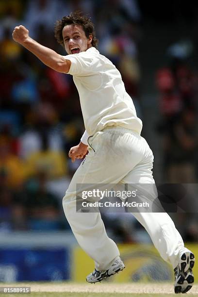 Beau Casson of Australia celebrates taking the wicket of Dwayne Bravo of the West Indies during day five of the third test match between the West...