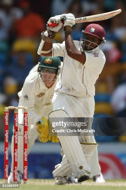 Shivnarine Chanderpaul hits out during day five of the third test match between the West Indies and Australia at Kensington Oval on June 16, 2008 in...