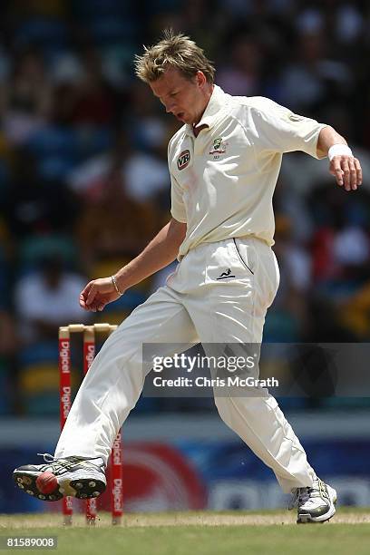 Brett Lee of Australia fields with his feet during day five of the third test match between the West Indies and Australia at Kensington Oval on June...