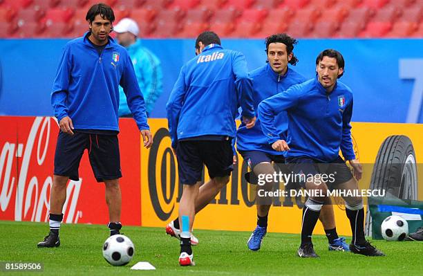 Italy's Marco Boriello , Fabio Grosso and Gianluca Zambrota during the official training session of the Italian football team, at Letzigrund stadium...