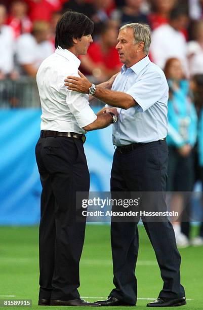 Josef Hickersberger, head coach of Austria shakes hands with Joachim Loew, head coach of Germany ahead of the UEFA EURO 2008 Group B match between...