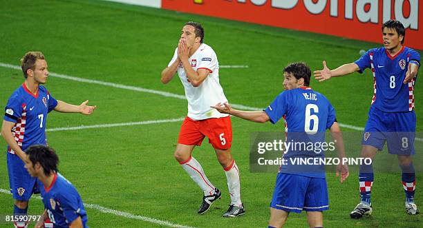 Polish midfielder Dariusz Dudka reacts after missing a goal opportunity during the Euro 2008 Championships Group B football match Poland vs. Croatia...