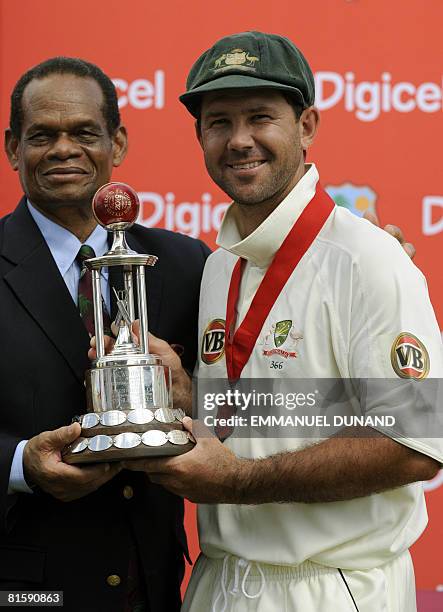 Australian cricket team captain Ricky Ponting receives the Worrell Trophy after his team's series victory over the West Indies at the end of the...