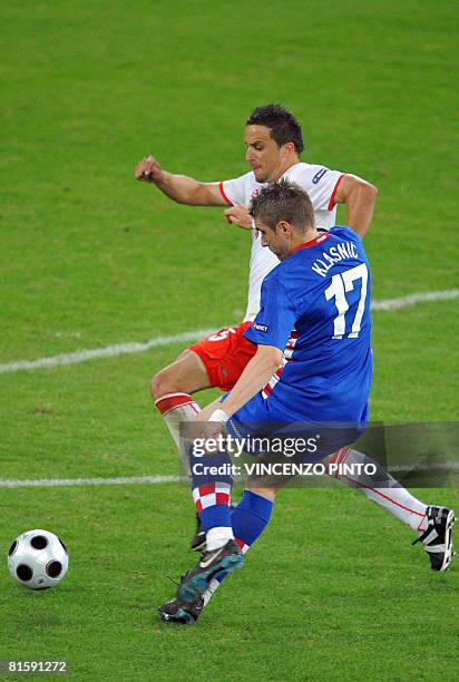 Croatian forward Ivan Klasnic vies with Polish midfielder Dariusz Dudka during the Euro 2008 Championships Group B football match Poland vs. Croatia...
