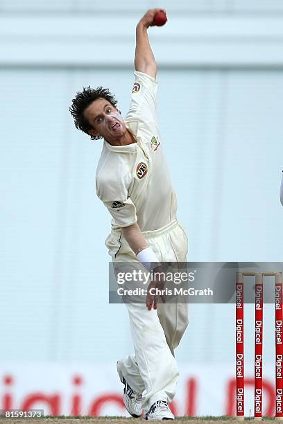 Beau Casson of Australia bowls during day five of the third test match between the West Indies and Australia at Kensington Oval on June 16, 2008 in...