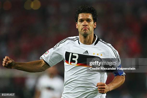 Michael Ballack of Germany celebrates after scoring the opening goal during the UEFA EURO 2008 Group B match between Austria and Germany at Ernst...