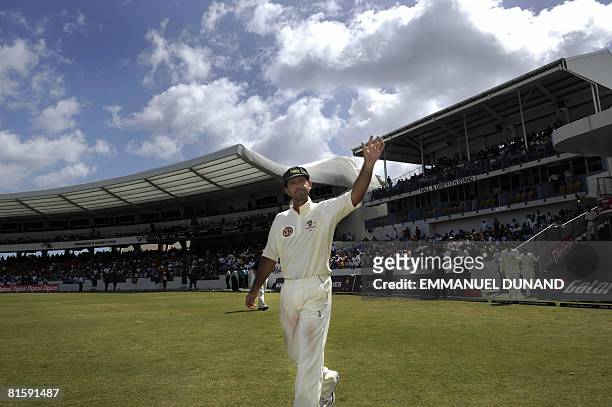 Australian captain Ricky Ponting acknowledges the crowd at the end of the fifth and last day of the third test match between the West Indies and...