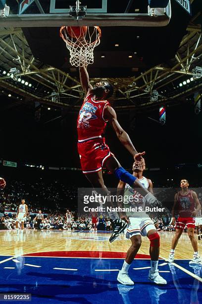James Worthy of the Western Conference All-Stars dunks against Ricky Pierce# 22 of the Eastern Conference All-Stars during the 1991 NBA All-Star Game...