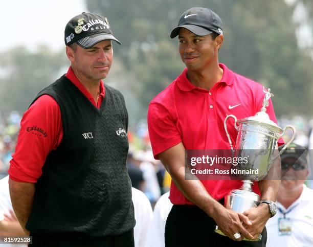 Tiger Woods stands with runner-up Rocco Mediate after winning on the first sudden death playoff hole during the playoff round of the 108th U.S. Open...