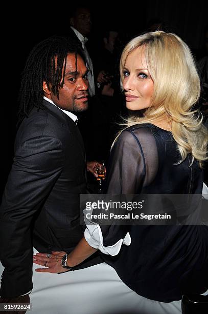 Christian Karembeu and wife Adriana Karembeu attend the Launch Party for the Ingenieur Automatic Edition Zin?dine Zidane watch, held at Palais de...