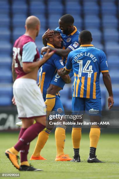 Zak Jules of Shrewsbury Town celebrates after scoring a goal to make it 1-0 during the pre-season friendly match between Shrewsbury Town and Aston...