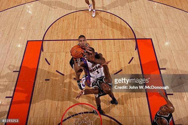 Basketball: NBA Playoffs, Aerial view of Phoenix Suns Amare Stoudemire in action, taking shot vs San Antonio Spurs Tim Duncan and Francisco Elson ,...