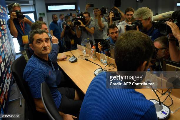 Barcelona's coach Ernesto Valverde poses before his first press conference at the Sports Center FC Barcelona Joan Gamper in Sant Joan Despi, near...