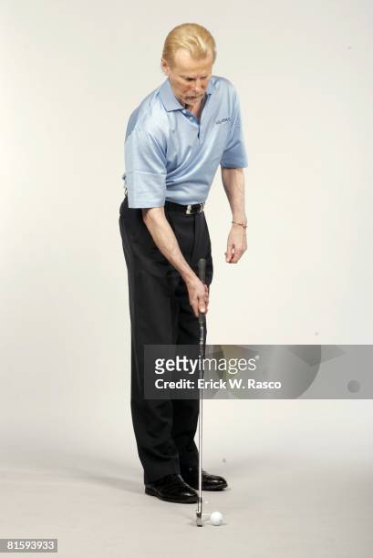 Golf: Portrait of pro T,J, Tomasi in action, demonstrating proper alignment of club face with target at Time Inc, Digital Studio, New York, NY...