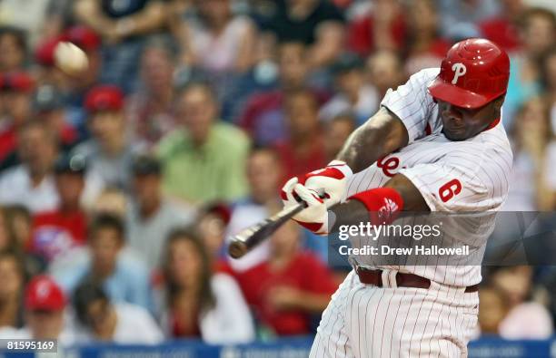 Ryan Howard of the Philadelphia Phillies hits the game winning two-run home-run in the bottom of the first inning during the game against the Boston...