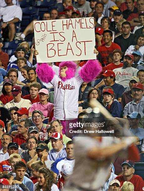 Fan holds a up a sign for pitcher Cole Hamels of the Philadelphia Phillies during the game against the Boston Red Sox at Citizens Bank Park June 16,...
