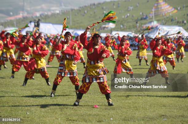 Tibetans perform during The 18th China nine color Gannan the Shambhala Tourism Arts Festival at Hezuo on July 17, in Gannan Tibetan Autonomous...