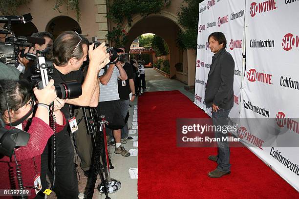 Cast member actor David Duchovny arrives at a themed poolside party for the DVD release of Californication Season 1 at an exclusive Los Angeles...