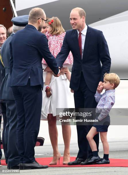 Prince William, Duke of Cambridge and Prince George of Cambridge as they arrive with Catherine, Duchess of Cambridge and Princess Charlotte of...