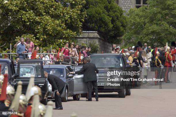 Bodyguards accompany members of the Royal family and Prince William's girlfriend Kate Middleton, as they arrive for the Order of the Garter service...