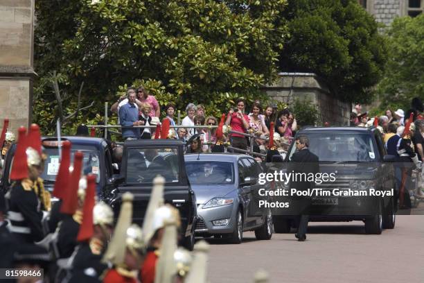 Bodyguards accompany members of the Royal family and Prince William's girlfriend Kate Middleton, as they arrive for the Order of the Garter service...