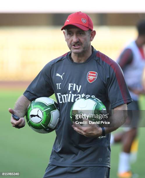 Tont Colbert and Arsenal coach during an Arsenal Training Session at Yuanshen Sports Centre Stadium on July 17, 2017 in Shanghai, China.