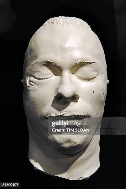 John Dillinger's death mask on loan from the FBI is part of the Newseum's first changing exhibition, "G-Men and Journalists" is viewed on June 17,...