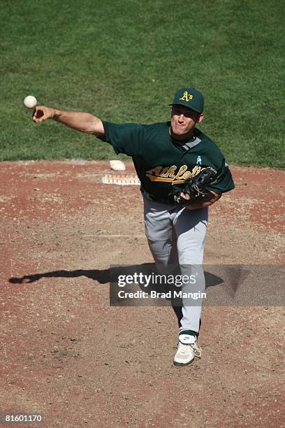 Huston Street of the Oakland Athletics pitches during the game against the San Francisco Giants at AT&T Park in San Francisco, California on June 15,...