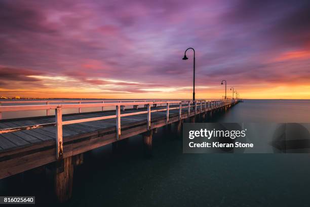 pier at sunset - st kilda stock-fotos und bilder