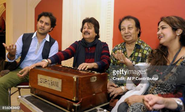 Indian Ghazal singers Javed Ali , Pankaj Udhas , Bhupinder Singh and Mitali Singh pose for a photograph during a rehearsal for the forthcoming...