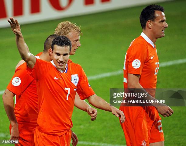 Dutch forward Robin van Persie celebrates with Dutch forward Jan Vennegoor of Hesselink and Dutch forward Dirk Kuyt after the Euro 2008 Championships...