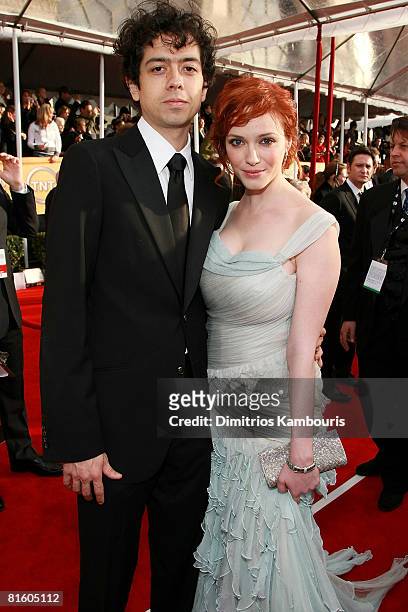 Actor Geoffrey Arend and Actress Christina Hendricks arrives to the TNT/TBS broadcast of the 14th Annual Screen Actors Guild Awards at the Shrine...