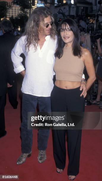 Actress Marina Sirtis and husband Michael Lamper attending the world premiere of "Conspiracy Theory" on August 4, 1997 at Mann Village Theater in...