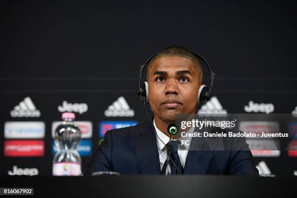 Douglas Costa of Juventus attends a press conference on July 17, 2017 in Turin, Italy.