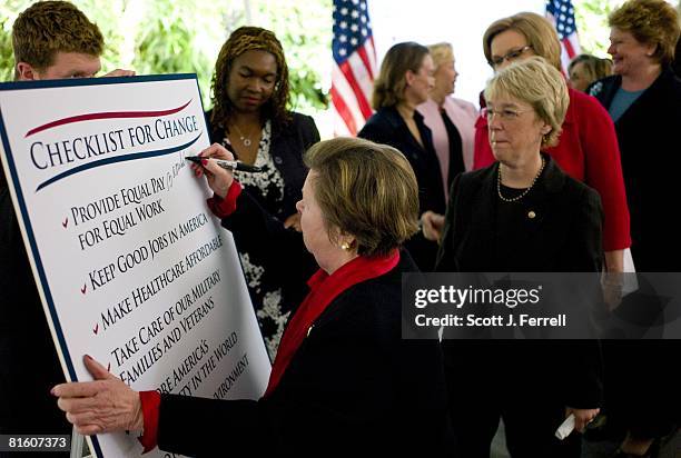 June 17: Sen. Barbara Mikulski, D-Md., signs the Senate Democratic women's "Checklist for Change" during an event at the Sewall-Belmont House. The...