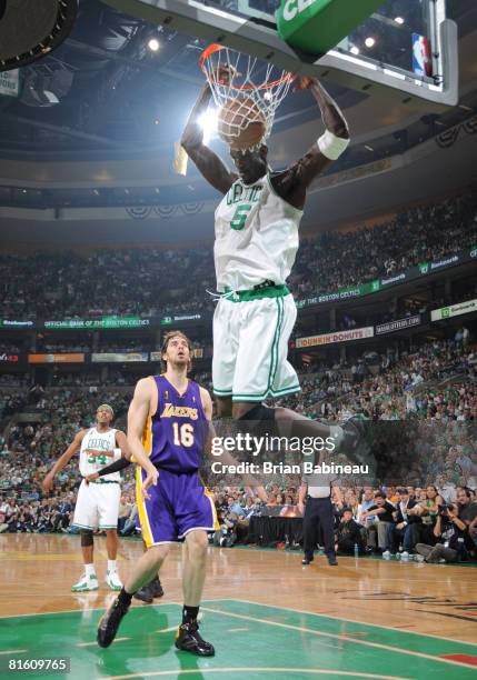 Kevin Garnett of the Boston Celtics dunks the ball against Pau Gasol of the Los Angeles Lakers during Game Six of the NBA Finals at the TD Banknorth...