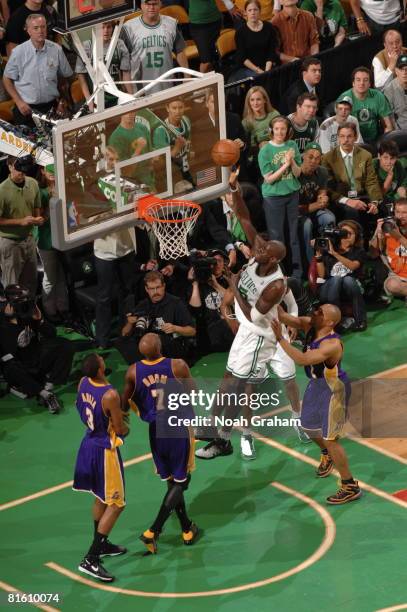 Kevin Garnett of the Boston Celtics shoots against Lamar Odom of the Los Angeles Lakers during Game Six of the 2008 NBA Finals on June 17, 2008 at TD...