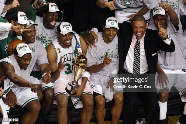 Glen Davis, Kevin Garnett, Paul Pierce, Ray Allen and head coach Doc Rivers of the Boston Celtics celebrate after defeating the Los Angeles Lakers in...