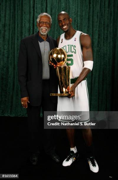 Legend Bill Russell and Kevin Garnett of the Boston Celtics pose for a portrait with the Larry O'Brien trophy after defeating the Los Angeles Lakers...