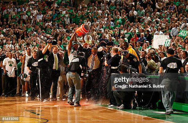 Paul Pierce of the Boston Celtics celebrates by pouring a cooler of Gatorade over head coach, Doc Rivers, after winning Game Six of the 2008 NBA...