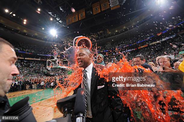 Paul Pierce dumps gatorade on coach Doc Rivers of the Boston Celtics after defeating the Los Angeles Lakers during Game Six of the NBA Finals at the...