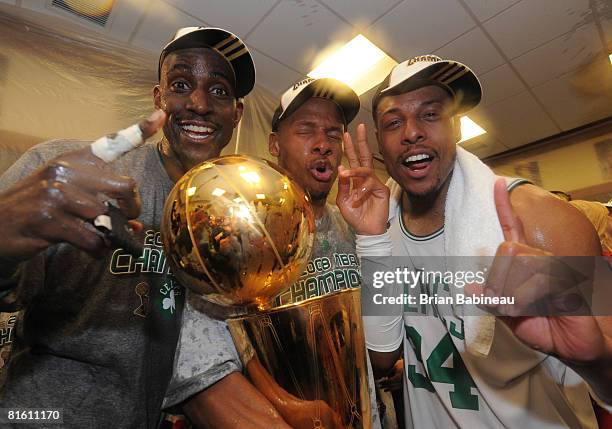 Kevin Garnett, Ray Allen and Paul Pierce of the Boston Celtics pose for a photo with the NBA Champion trophy after defeating the Los Angeles Lakers...