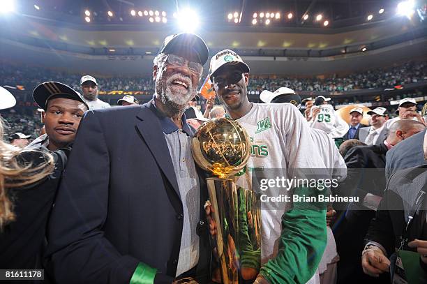 Kevin Garnett of the Boston Celtics poses with former Boston Celtic Bill Russell after defeating the Los Angeles Lakers during Game Six of the NBA...