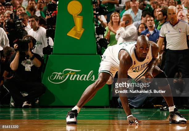 Kevin Garnett of the Boston Celtics stretches during Game Six of the 2008 NBA Finals against the Los Angeles Lakers on June 17, 2008 at the TD...