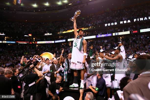 Finals MVP Paul Pierce of the Boston Celtics celebrates with the MYP trophy after the Celtics won 131-92 against the Los Angeles Lakers to win the...