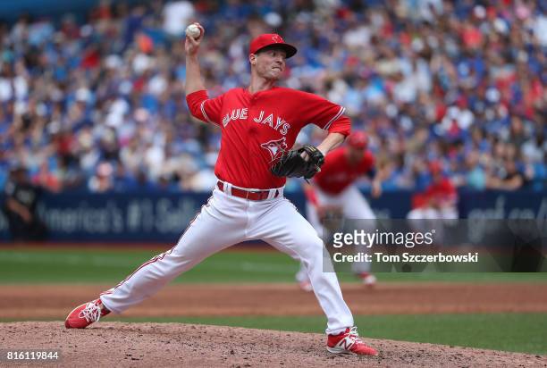 Lucas Harrell of the Toronto Blue Jays delivers a pitch in the sixth inning during MLB game action against the Houston Astros at Rogers Centre on...
