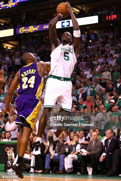 Kevin Garnett of the Boston Celtics attempts a shot against Kobe Bryant of the Los Angeles Lakers in Game Six of the 2008 NBA Finals on June 17, 2008...