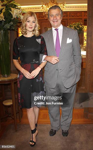 Rosamund Pike and Arnaud Bamberger launche the Cartier Love Charity Braclet in support of action against hunger at Catrier's Bond Street store on...